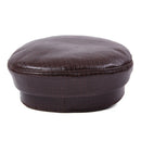 Brown leather beret on a white background, Obroi