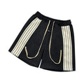 Black shorts with white stripes on a white background, Obroi