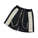 Black shorts with white stripes on a white background, Obroi