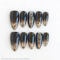 Set of black and gold decorative nails on a white background, Obroi