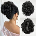 Black curly hair bun hairpiece shown worn on a model from the back, plus two close-up views of the hairpiece itself on a light background, Obroi