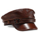 Brown leather cap with a buckle on a white background, Obroi