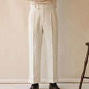 Beige wide-leg pants worn by a person against a plain background, Obroi