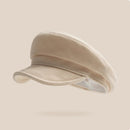 Beige cap on a light beige background with 'Obroi' branding.