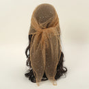 Brown headscarf with a bow on a mannequin head against a white background, Obroi