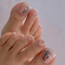 Close-up of hands with butterfly nail art on a light background, Obroi