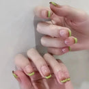 Close-up of hands with green nail polish on a neutral background, Obroi