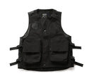 Black tactical vest with multiple pockets and straps on a white background, Obroi