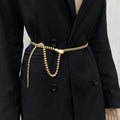 Black coat with a gold belt on a plain background, Obroi