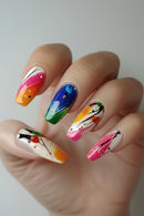 Colorful nail art on a hand with a neutral background, Obroi