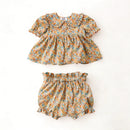 Floral baby top and bloomers set on a white background, Obroi