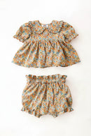 Floral baby top and bloomers set on a white background, Obroi
