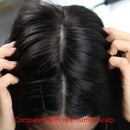 Close-up of a person's scalp with a visible hairline, hands holding hair, and text 'Compared with real human scalp', Obroi