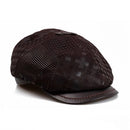 Brown textured newsboy cap on a white background, Obroi