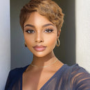 Woman with short hair wearing a blue top against a neutral background ,Obroi