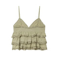 A light sage green ruffled camisole top with thin straps and delicate lace trim, displayed flat against a solid white background, Obroi