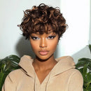 Woman with styled hair wearing a beige hoodie against a light background, Obroi
