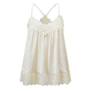 An ivory white lace and satin slip dress with thin adjustable shoulder straps, a scalloped lace neckline, and a matching lace hem, shown against a plain white background, Obroi