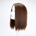 A straight, shoulder-length brown wig with side-swept bangs displayed on a white mannequin head against a plain white background, Obroi