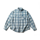 Blue plaid shirt on a white background