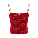 A red smocked camisole top with white polka dots and thin spaghetti straps, shown against a plain white background, Obroi