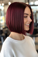 Woman with a stylish bob haircut in a salon setting, Obroi