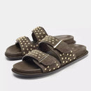 Brown sandals with gold studs on a white background, Obroi