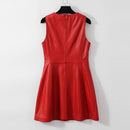 Red leather dress on a hanger against a white background, Obroi