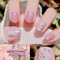 Collage of hands with pink floral nail design and a pink phone case, Obroi
