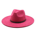 Pink fedora hat with a black band on a white background, Obroi