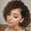 Woman with styled hair and makeup against a neutral background, Obroi