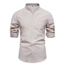 Beige striped shirt with rolled-up sleeves on a white background, Obroi