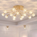 Gold ceiling light fixture with crystal-like glass balls on a ceiling, Obroi