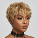 Woman with styled blonde hair and sparkly makeup on a plain background, Obroi