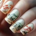 Nails with scenic design featuring mountains and trees.