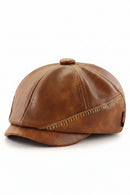 Brown leather cap on a white background, Obroi