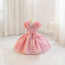 Pink dress with floral details on a mannequin against a white background, Obroi