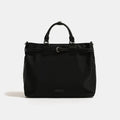 Black handbag on a light gray background, Obroi