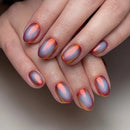 Close-up of hands with multicolored nail polish on a neutral background, Obroi