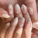 Nails with floral designs on a light background, Obroi