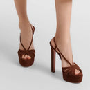 Brown suede high-heeled sandals on a white background, Obroi