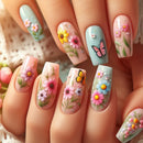 Nails with floral and butterfly designs in pastel colors, Obroi