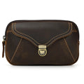 Obroi Brown leather pouch with gold stitching and clasp on a white background