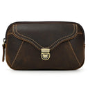 Obroi Brown leather pouch with gold stitching and clasp on a white background