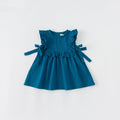 Blue dress with ruffled details on a white background, Obroi