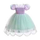Children's dress with purple top and green skirt on a white background, Obroi