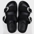 Black sandals with decorative buckles on a white background, Obroi