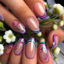 Nails with floral designs and colorful accents against a floral background, Obroi