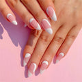 Close-up of hands with pink and white nail polish on a pink background, Obroi