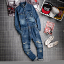 Blue denim jumpsuit with white sneakers on a tiled floor, Obroi